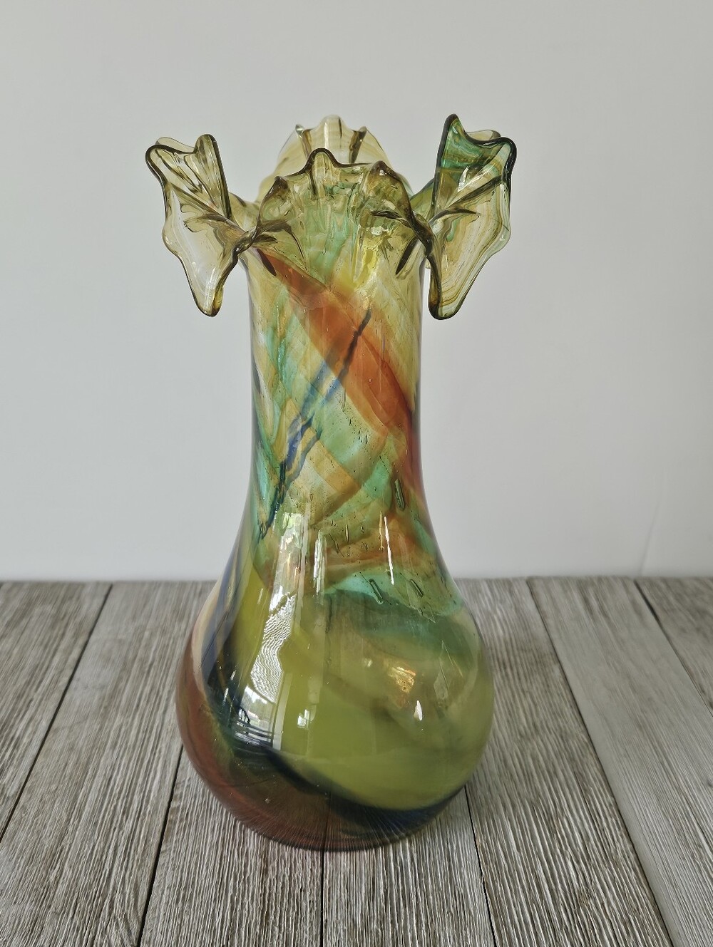 8.5" Hand Blown Green Glass Vase with Flared Top Edge and Multi-Colored Earth